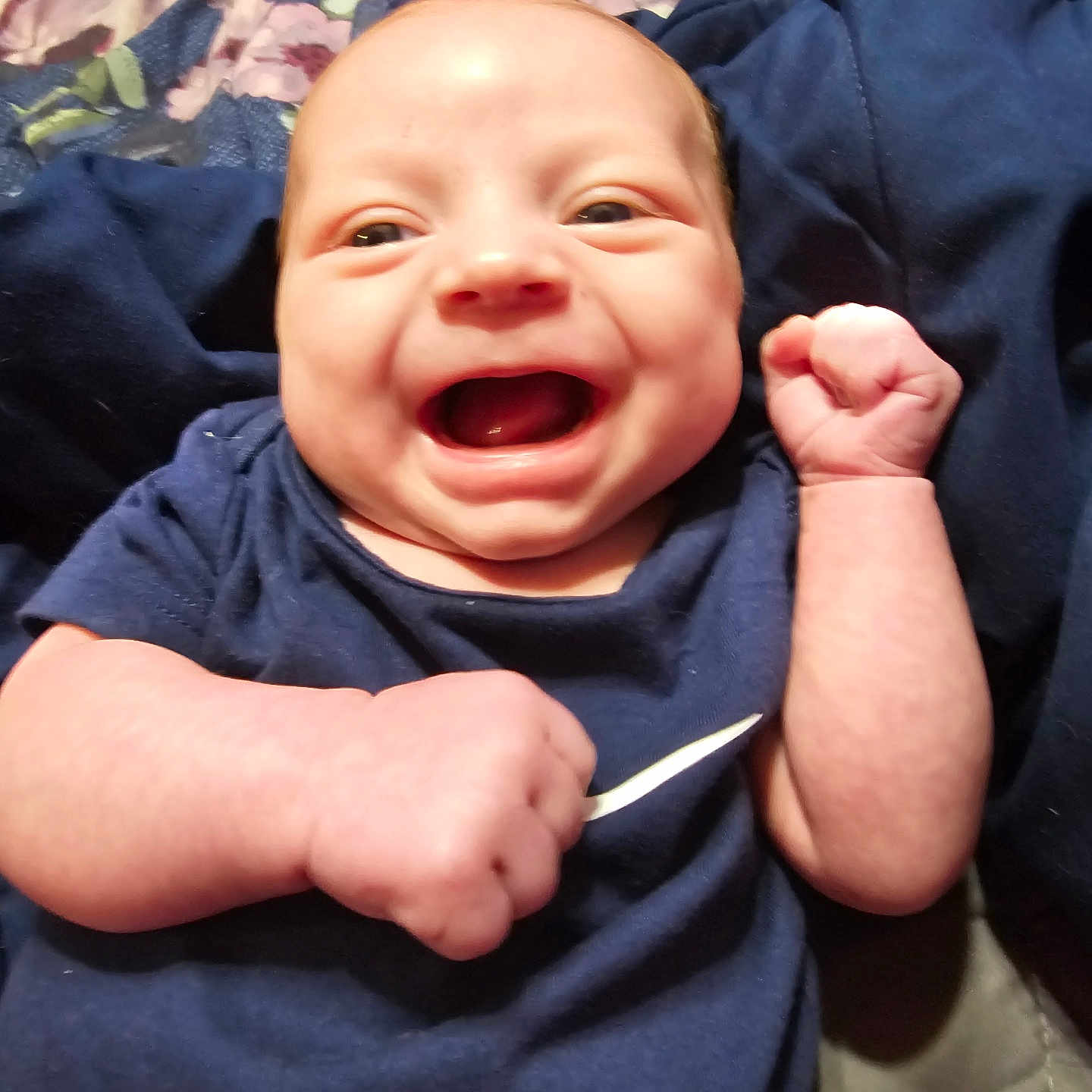 Jaxon joined the competition — help win amazing prizes! baby, babylaughing, bodypart, clothing, face, finger, hand, happy, head, laughing, mouth, newborn, pants, person, photography, portrait, quilt, smile, t_shirt, teeth