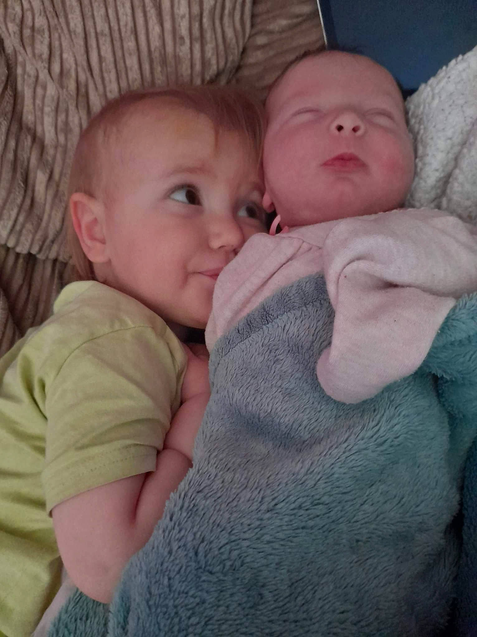 Liliana joined the competition — help win amazing prizes! arm, baby, baby_toddler_clothing, cheek, chin, comfort, eye, finger, gesture, human_body, iris, lip, mammal, mouth, nose, organ, person, skin, sleeve, smile