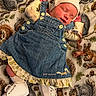 Iris is registered to the contest to win money with this photo: newborn, baby, sleeping, denim_dress, white_shoes, striped_hat, plush_toy, blanket, squirrel_pattern, infant, cute, cozy, soft, peaceful, child, clothing, footwear, portrait, indoors, resting