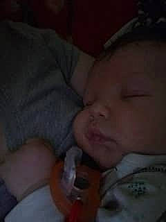 Timothy is registered to the contest to win money with this photo: baby, baby_products, baby_toddler_clothing, bedtime, cheek, child, comfort, ear, eyebrow, eyelash, finger, iris, lip, nap, nose, person, room, sleep, thumb, toddler