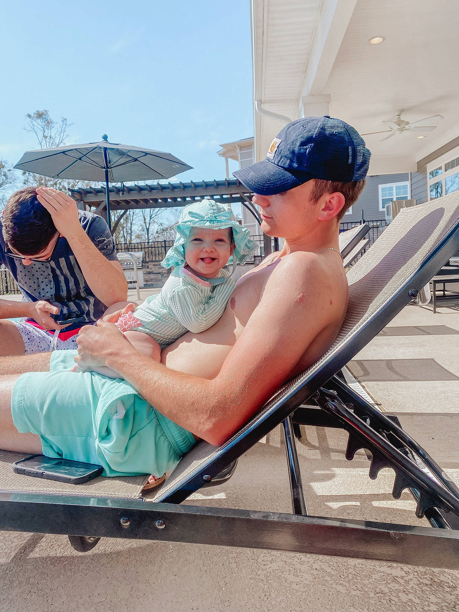 Everly joined the competition — help win amazing prizes! baseball_cap, cap, comfort, event, eyewear, fun, goggles, hat, headwear, human_leg, joy, leisure, outdoor_furniture, person, recreation, shorts, sitting, sky, sun_tanning, sunlounger