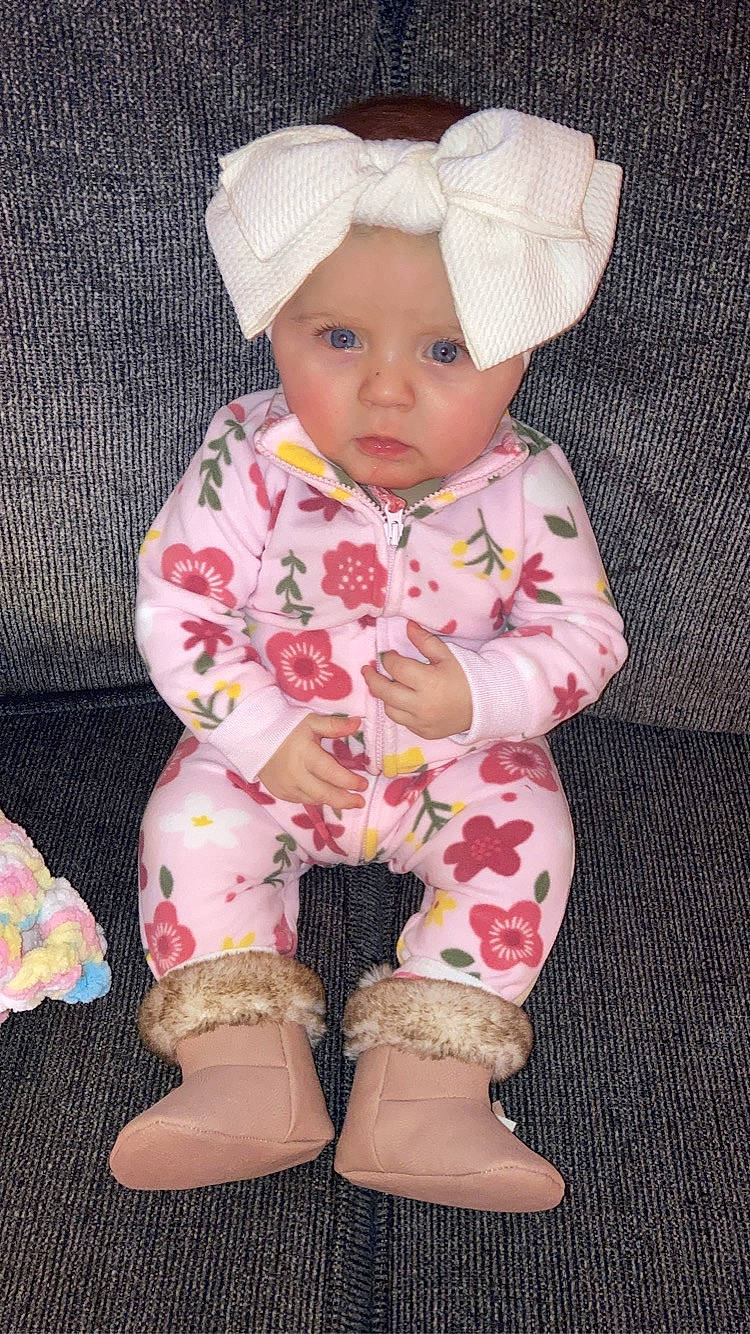 Koraline joined the competition — help win amazing prizes! baby, baby_products, baby_toddler_clothing, beige, bonnet, boot, button, cheek, child, clog, costume_accessory, embellishment, foot, headwear, nose, person, pink, shoe, skin, sleeve