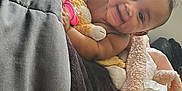 Miracle is registered to the contest to win money with this photo: architecture, baby, bed, bedroom, blanket, building, couch, face, furniture, happy, head, homedecor, hospital, indoors, newborn, person, photography, portrait, room, smile