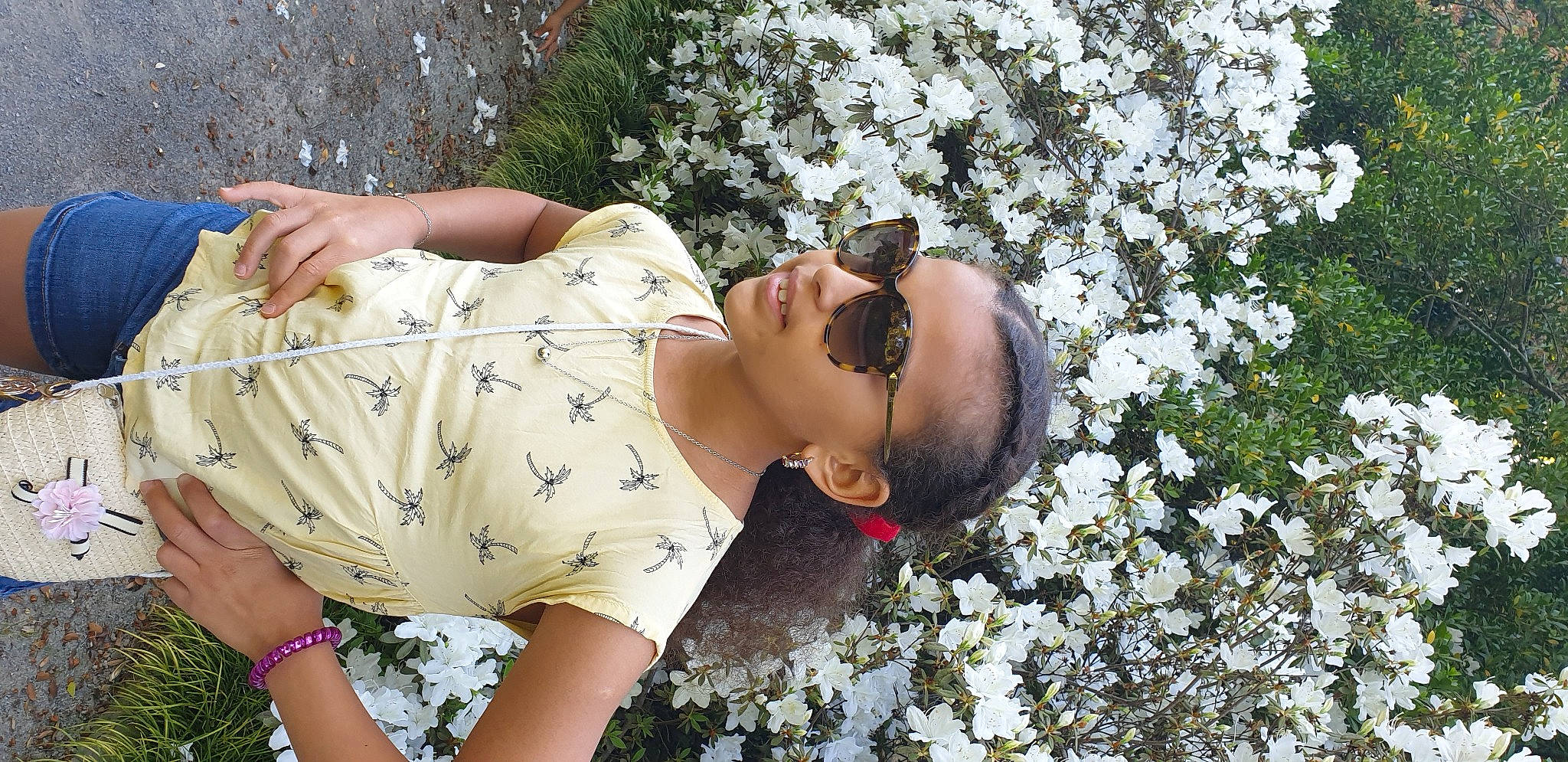 Fatine participe au concours pour gagner de l'argent avec cette photo : botany, dress, eyewear, fawn, flower, glasses, grass, happy, human_body, nature, people_in_nature, person, petal, plant, sunglasses, textile, thigh, tree, trunk, vision_care