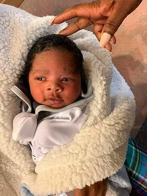 Lester joined the competition — help win amazing prizes! arm, baby, baby_products, blanket, cheek, child, ear, fur, hand, head, human, linens, neck, nose, person, product, skin, smile, textile, toddler