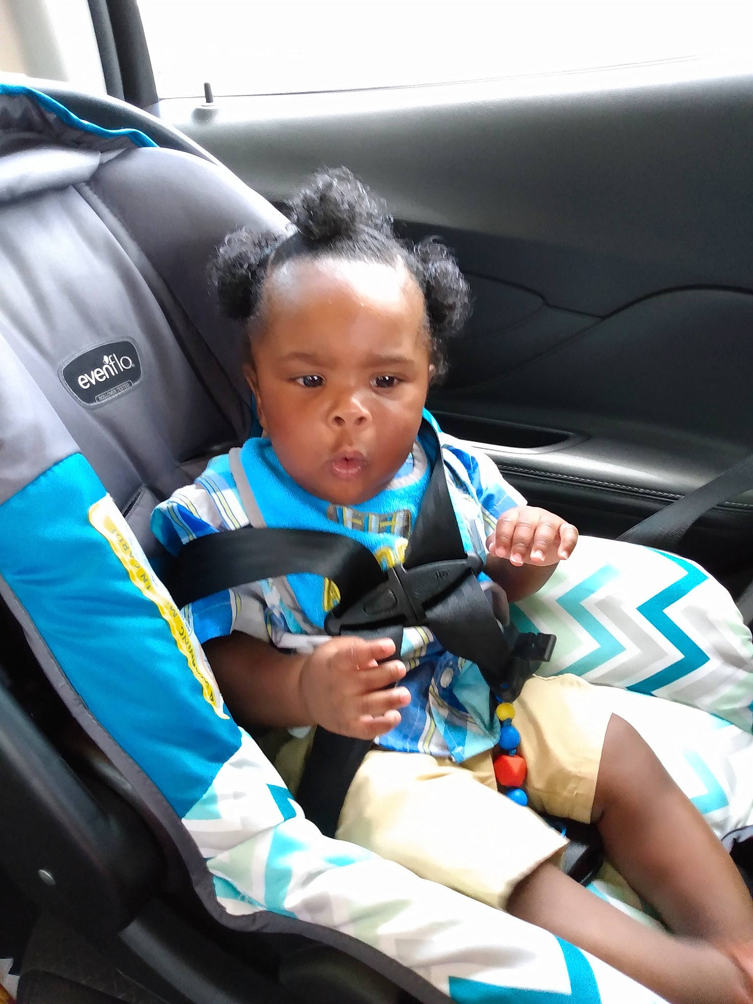 Lester is registered to the contest to win money with this photo: auto_part, baby, baby_carriage, baby_in_car_seat, baby_products, car, car_seat, child, city_car, driving, family_car, person, product, seat_belt, toddler, vacation, vehicle