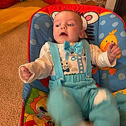 Winston joined the competition — help win amazing prizes! baby, infant, child, blue_outfit, baby_chair, animal_prints, cat, orange_cat, carpet, red_shoes, motion_blur, indoor, cute, playful, colorful, suspenders, bow_tie, person, furniture, floor