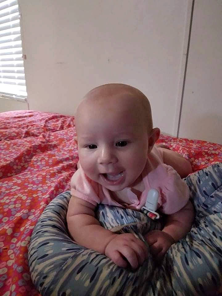 Brylee is registered to the contest to win money with this photo: baby, baby_toddler_clothing, cheek, comfort, eye, flash_photography, floor, flooring, fun, happy, iris, mammal, mouth, person, pink, skin, sleeve, smile, textile, toddler