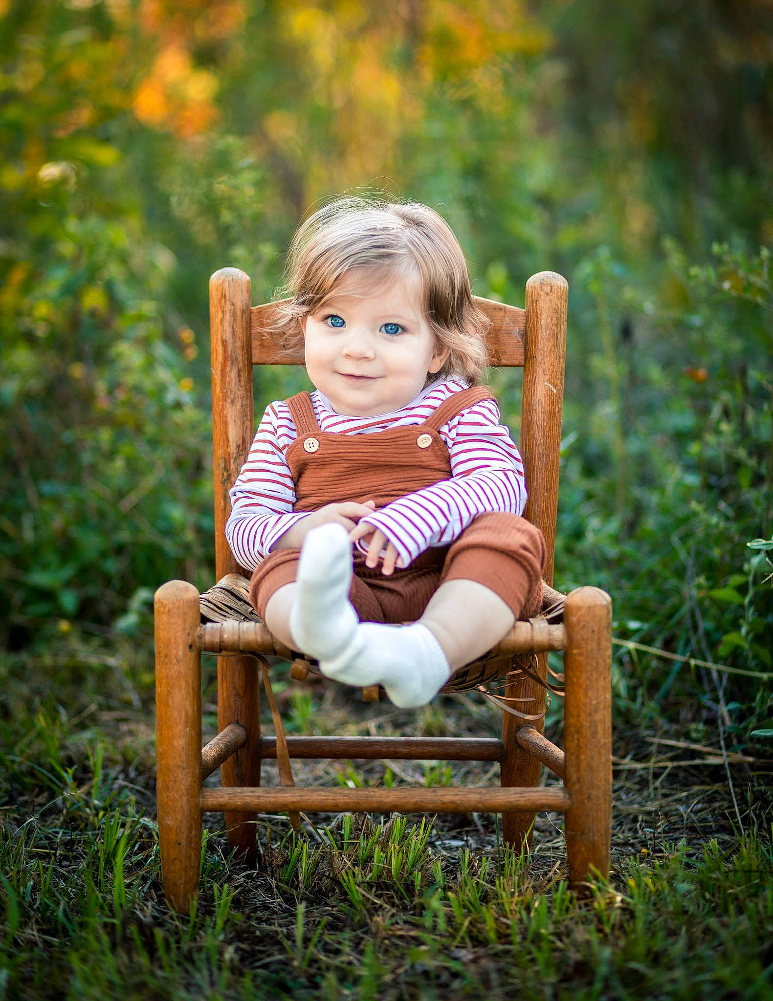 Crimson is registered to the contest to win money with this photo: baby, baby_toddler_clothing, chair, child, dress, fawn, flash_photography, fun, grass, grass_family, happy, joy, leisure, people_in_nature, person, plant, sitting, smile, sunlight, toddler