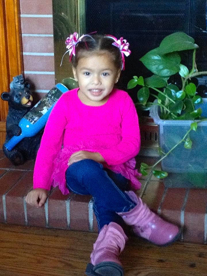 Cori is registered to the contest to win money with this photo: baby_toddler_clothing, cheek, door, electric_blue, eye, fashion_accessory, hair, happy, head, iris, joy, leg, magenta, person, pink, plant, purple, shoe, sitting, smile