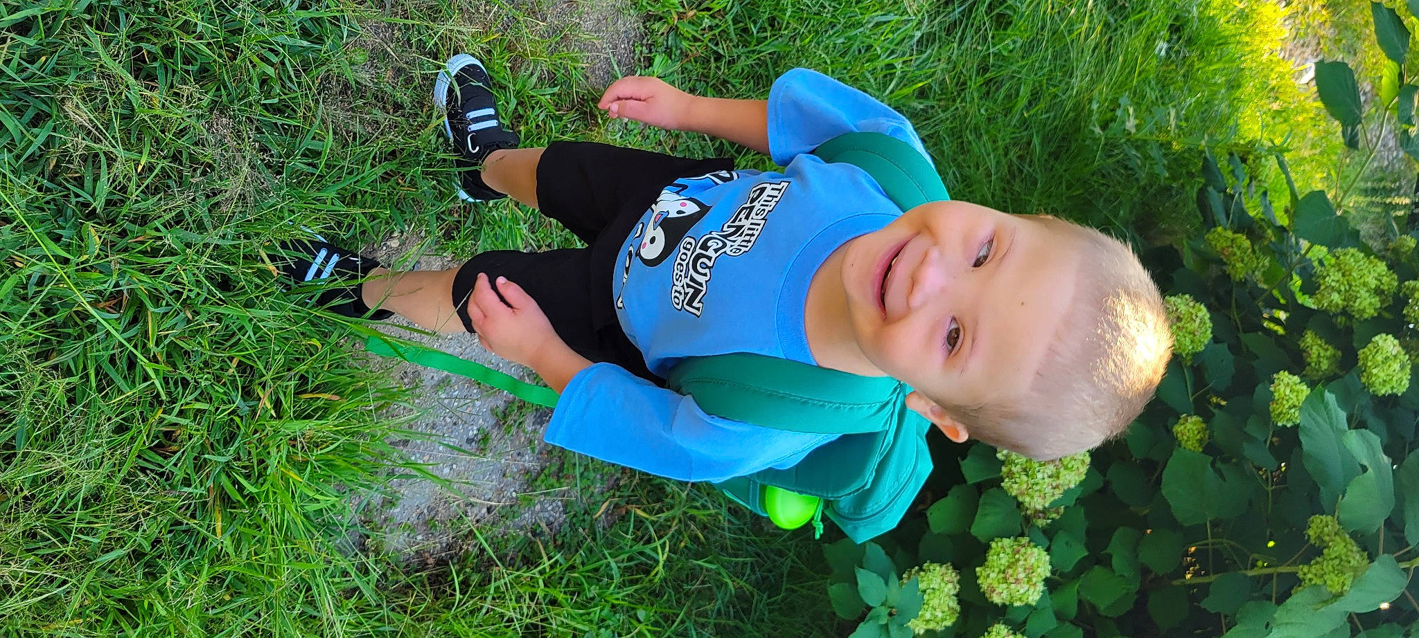 Caleb Murphy joined the competition — help win amazing prizes! baby, electric_blue, fun, grass, grass_family, grassland, groundcover, happy, human_leg, joy, knee, lawn, leisure, people_in_nature, person, plant, recreation, smile, summer, thigh