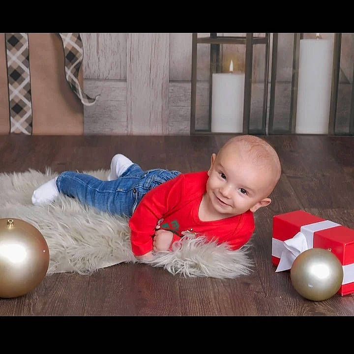 Drew joined the competition — help win amazing prizes! baby, baby_toddler_clothing, baby_toys, child, comfort, crawling, flash_photography, floor, flooring, fun, happy, hardwood, joy, lighting, person, room, sitting, smile, t_shirt, toddler