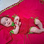 Mirelysbella joined the competition — help win amazing prizes! baby, infant, red_clothing, crochet, green_ribbons, lying_down, fabric, cute, smiling, hand, foot, headband, portrait, indoors, child, person, happy, skin, baby_girl, bright_colors