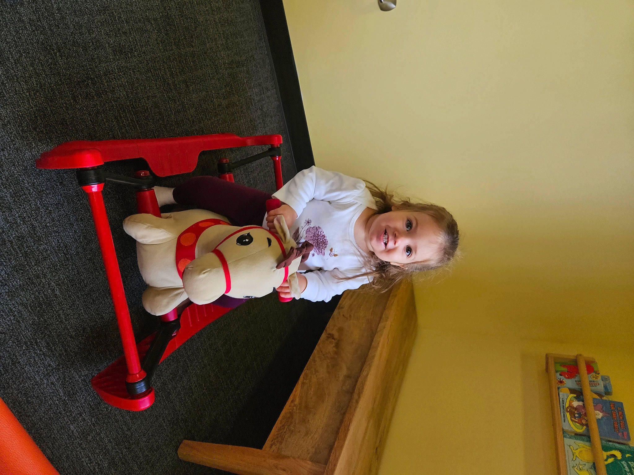 Dakota is registered to the contest to win money with this photo: baby, baby_products, baby_safety, baby_toddler_clothing, baby_toys, chair, child, comfort, flooring, hardwood, joy, knee, person, room, sitting, sock, toddler, varnish, wood
