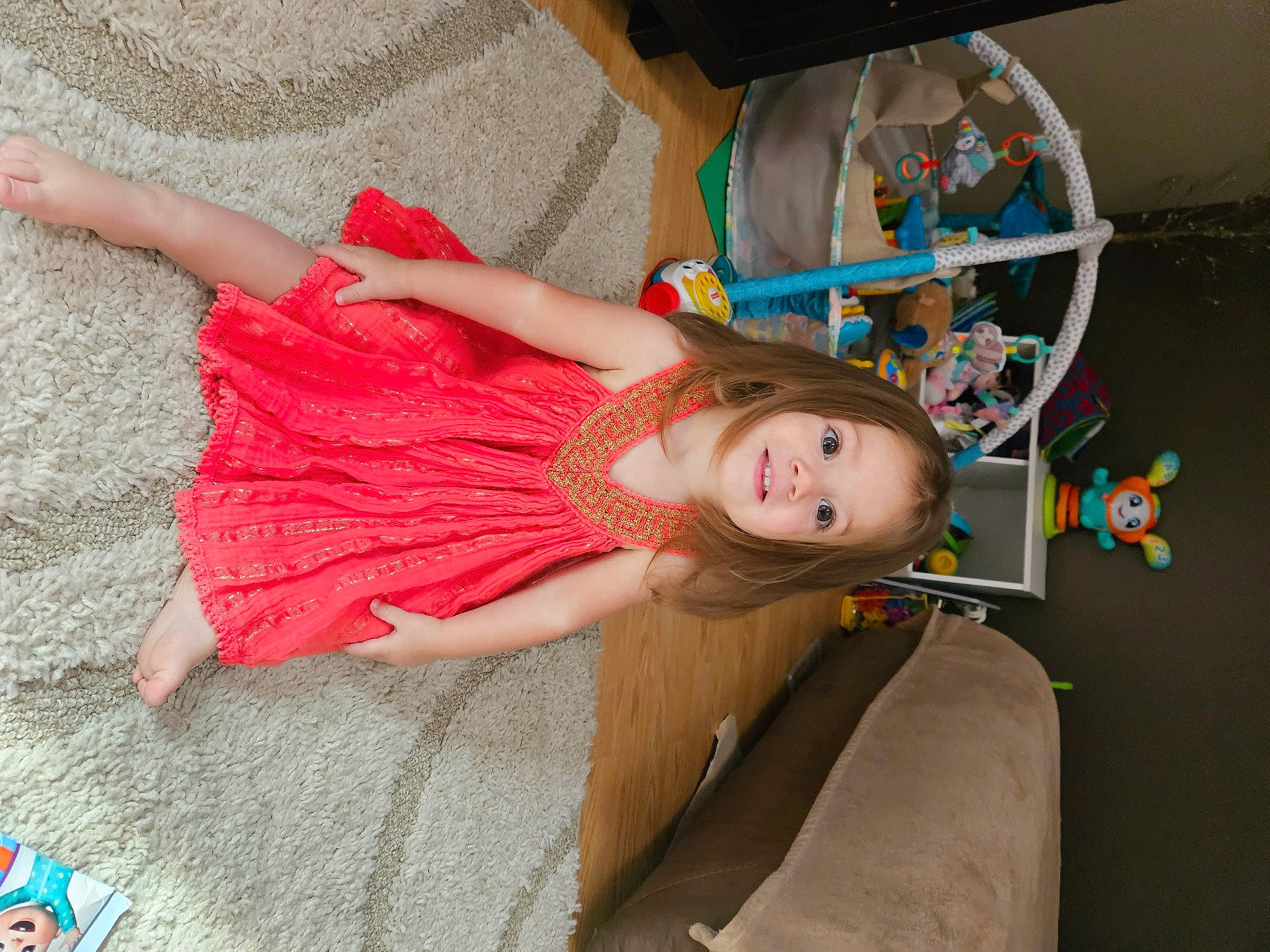 Dakota is registered to the contest to win money with this photo: beauty, child, costume, dress, eyelash, fashion_accessory, fun, happy, human_leg, joy, magenta, pattern, peach, person, pink, room, skin, textile, thigh, toddler