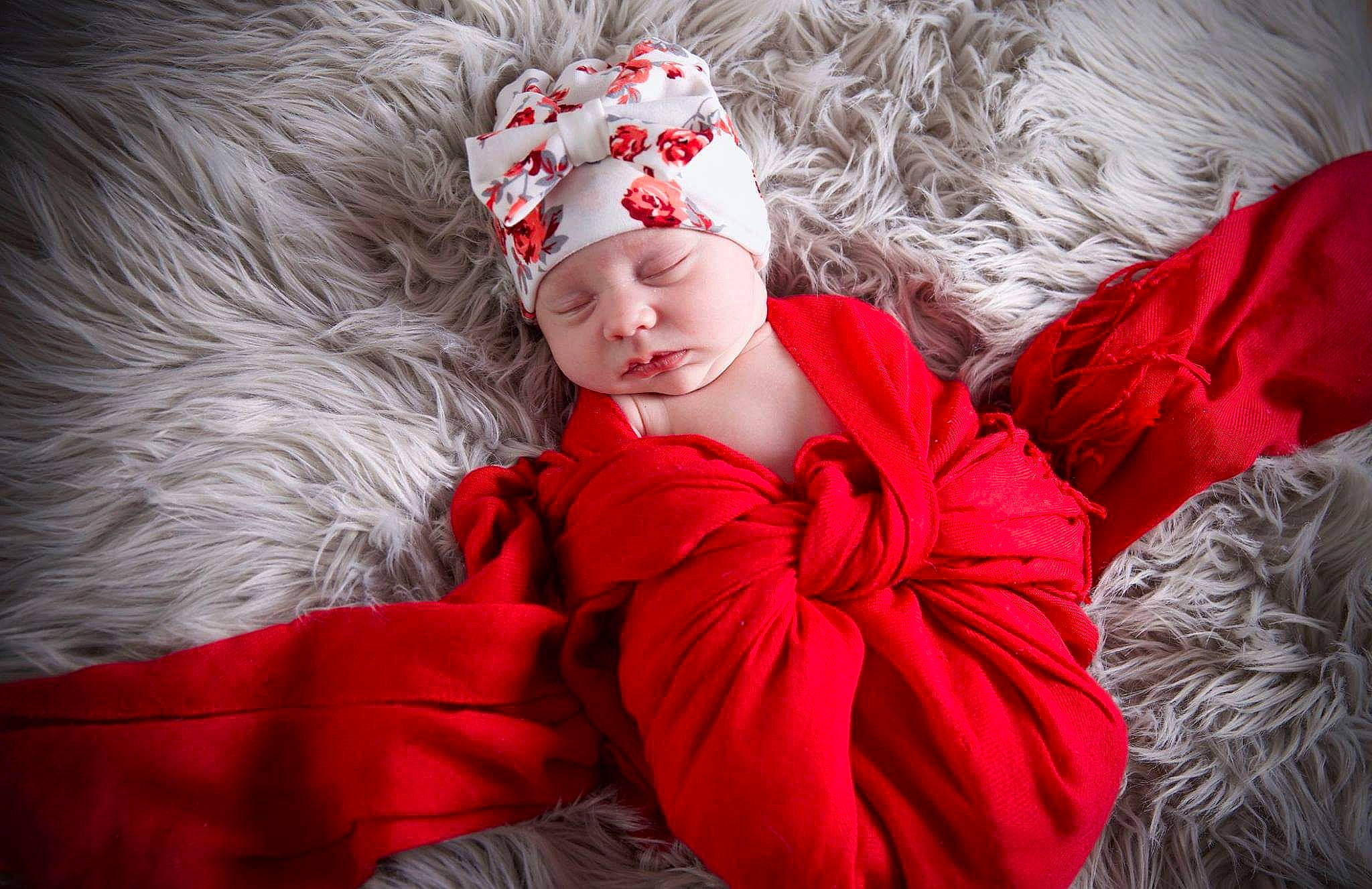 Maebelle joined the competition — help win amazing prizes! baby, beanie, child, christmas, christmas_eve, ear, fictional_character, fun, fur, happy, headgear, holiday, knit_cap, person, red, santa_claus, smile, toddler, tree, winter