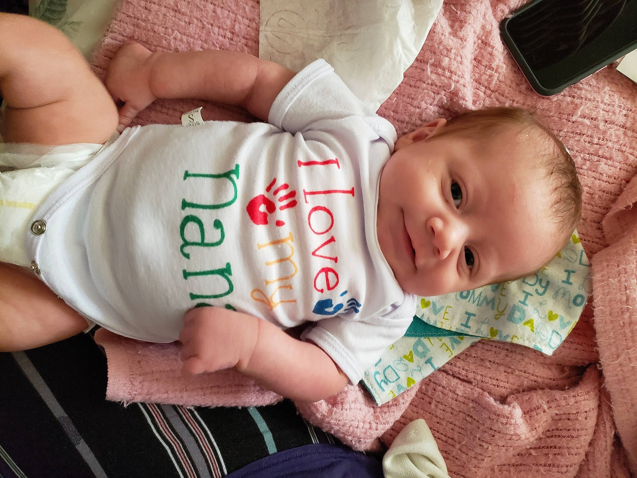 Henlee is registered to the contest to win money with this photo: baby, baby_products, baby_sleeping, baby_toddler_clothing, cheek, child, diaper, hand, person, product, skin, toddler