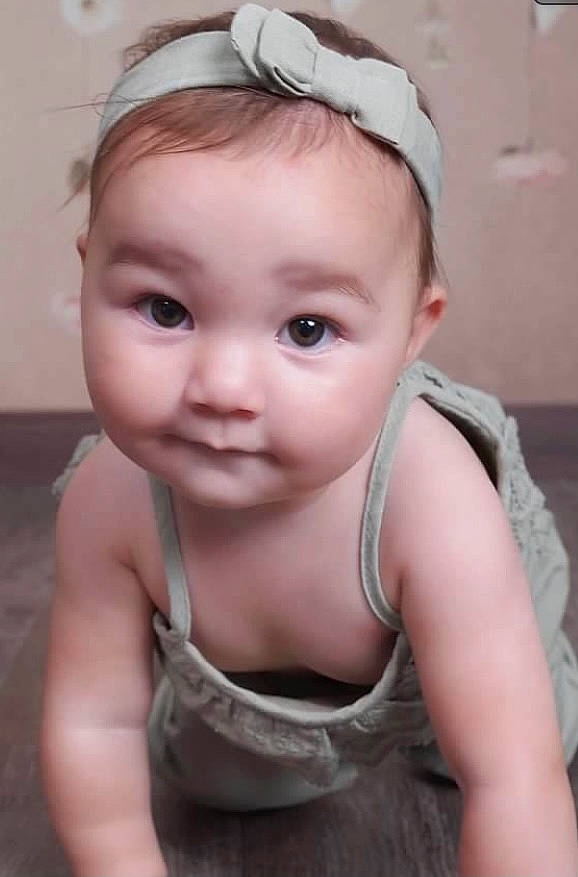 Maizy is registered to the contest to win money with this photo: baby, baby_toddler_clothing, cheek, chest, dress, eye, eyebrow, eyelash, face, flash_photography, happy, head, iris, lip, neck, nose, person, skin, smile, toddler