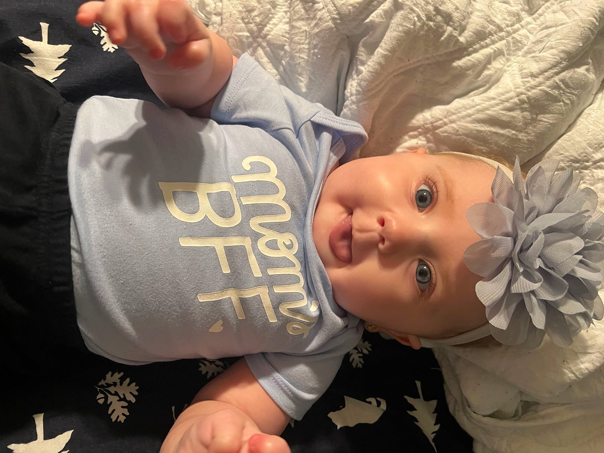 Alaina is registered to the contest to win money with this photo: baby, cheek, child, comfort, cool, eye, finger, fun, gesture, happy, head, headgear, headwear, mouth, nose, person, selfie, sleeve, smile, t_shirt