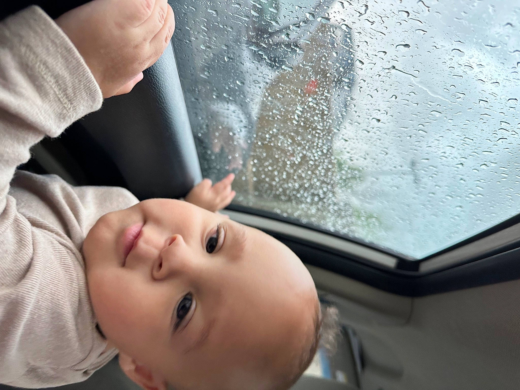 Cassius is registered to the contest to win money with this photo: art, automotive_exterior, automotive_lighting, child, eyebrow, eyelash, finger, flash_photography, gesture, glass, hand, happy, hood, mouth, nose, person, toddler, vehicle_door, water, windscreen_wiper