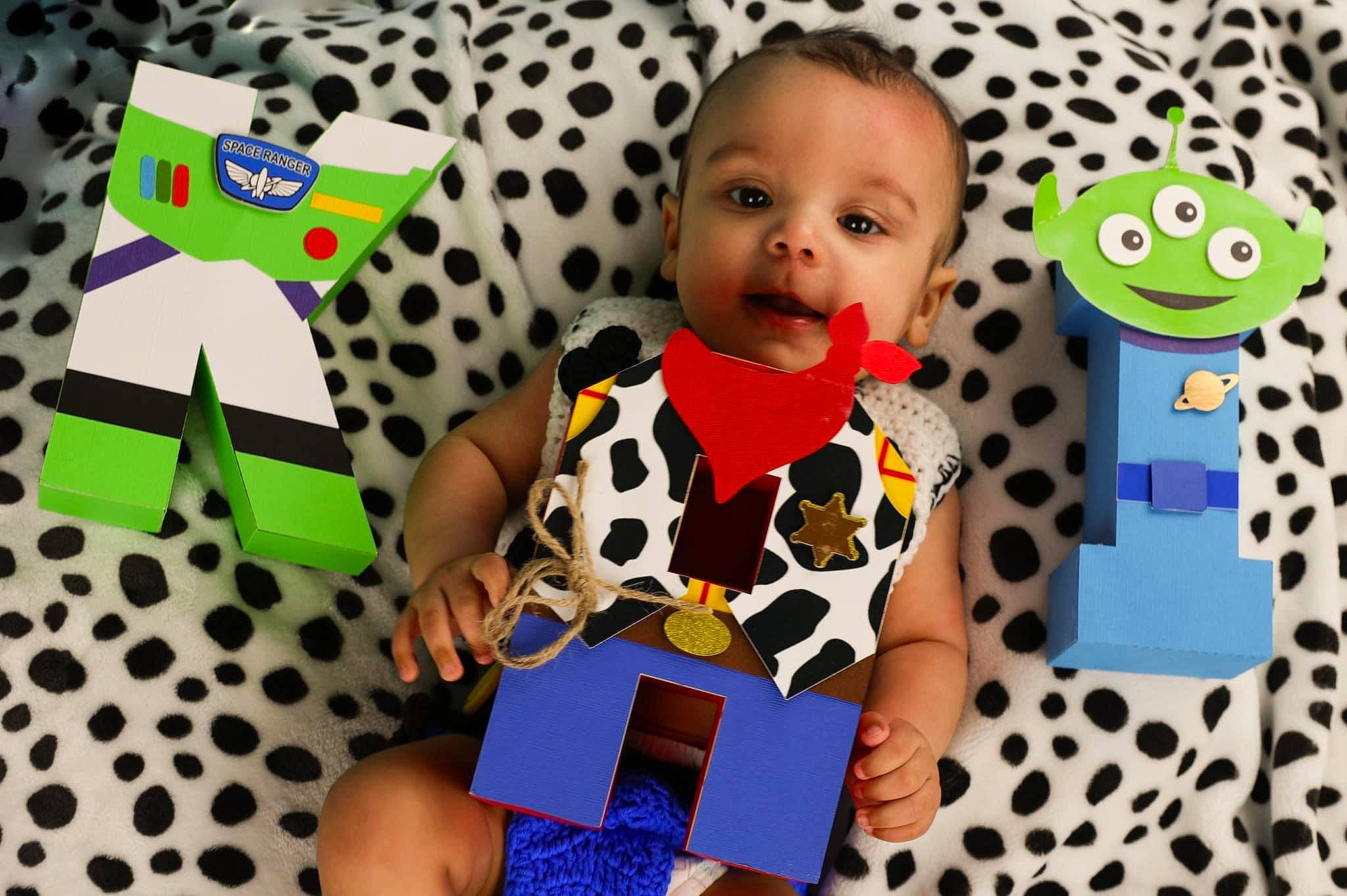 Kai joined the competition — help win amazing prizes! baby, baby_products, baby_toddler_clothing, child, electric_blue, facial_expression, font, fun, green, happy, pattern, person, photograph, polka_dot, product, sleeve, t_shirt, textile, toddler, visual_arts