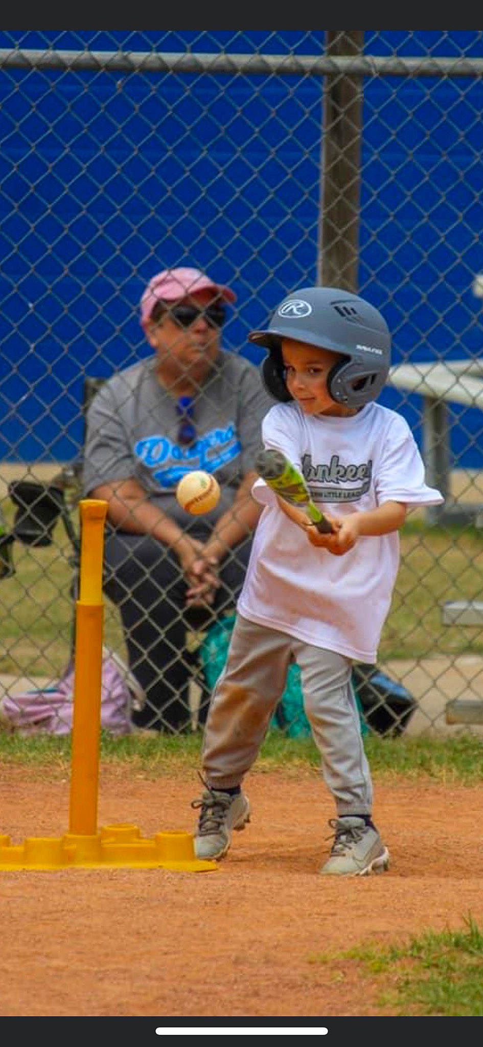 Oakland is registered to the contest to win money with this photo: ball_game, baseball, baseball_cap, baseball_equipment, baseball_field, baseball_park, baseball_player, baseball_protective_gear, bat_and_ball_games, blue, cap, fence, hat, headwear, helmet, person, player, sneakers, sports_equipment, sports_gear