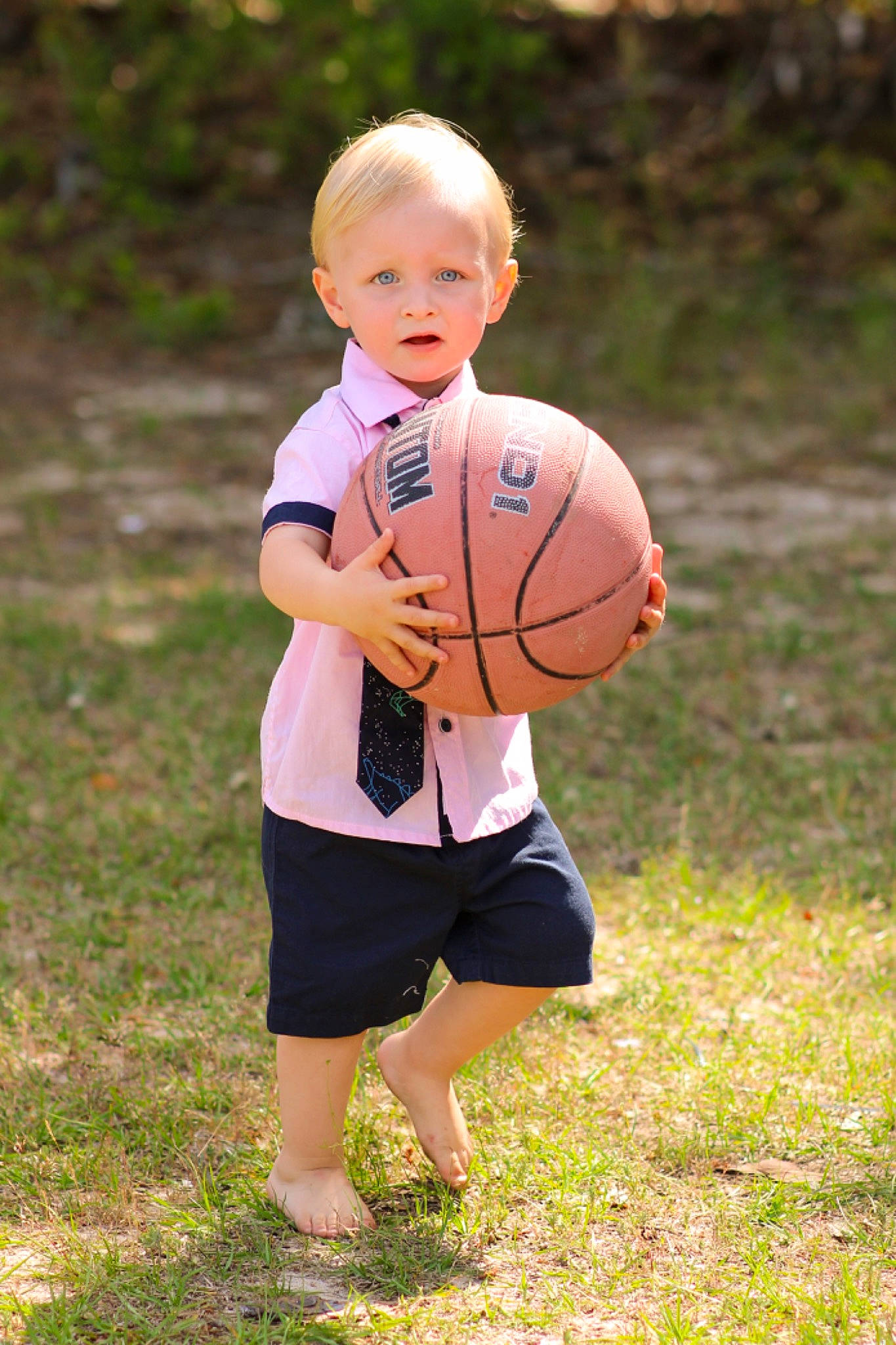 Carter joined the competition — help win amazing prizes! ball, ball_game, basketball, child, football, grass, happy, leisure, people_in_nature, person, player, playing_sports, playing_with_kids, recreation, shorts, soccer_ball, sports, sports_equipment, sports_toy, team_sport