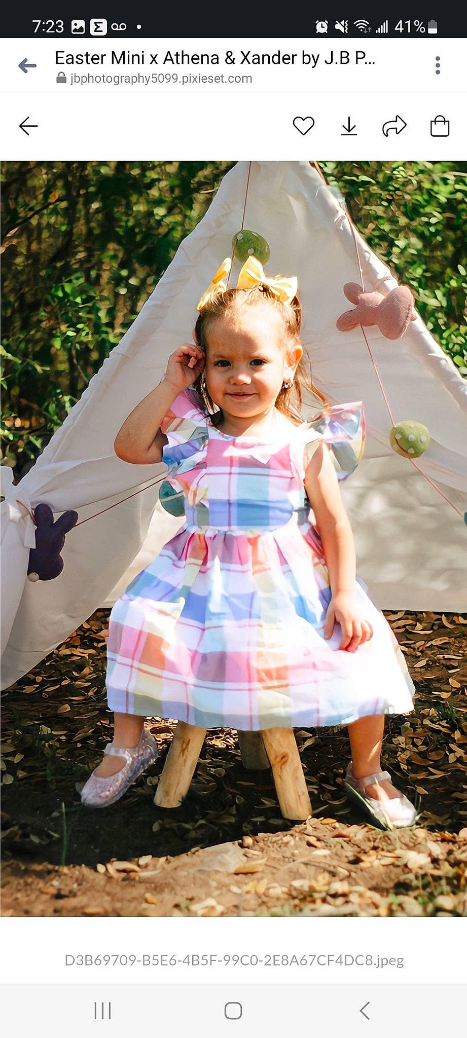 Athena is registered to the contest to win money with this photo: baby_toddler_clothing, beauty, child, day_dress, dress, event, fun, grass, happy, head, joy, leisure, pattern, people_in_nature, person, pink, plaid, plant, skin, textile