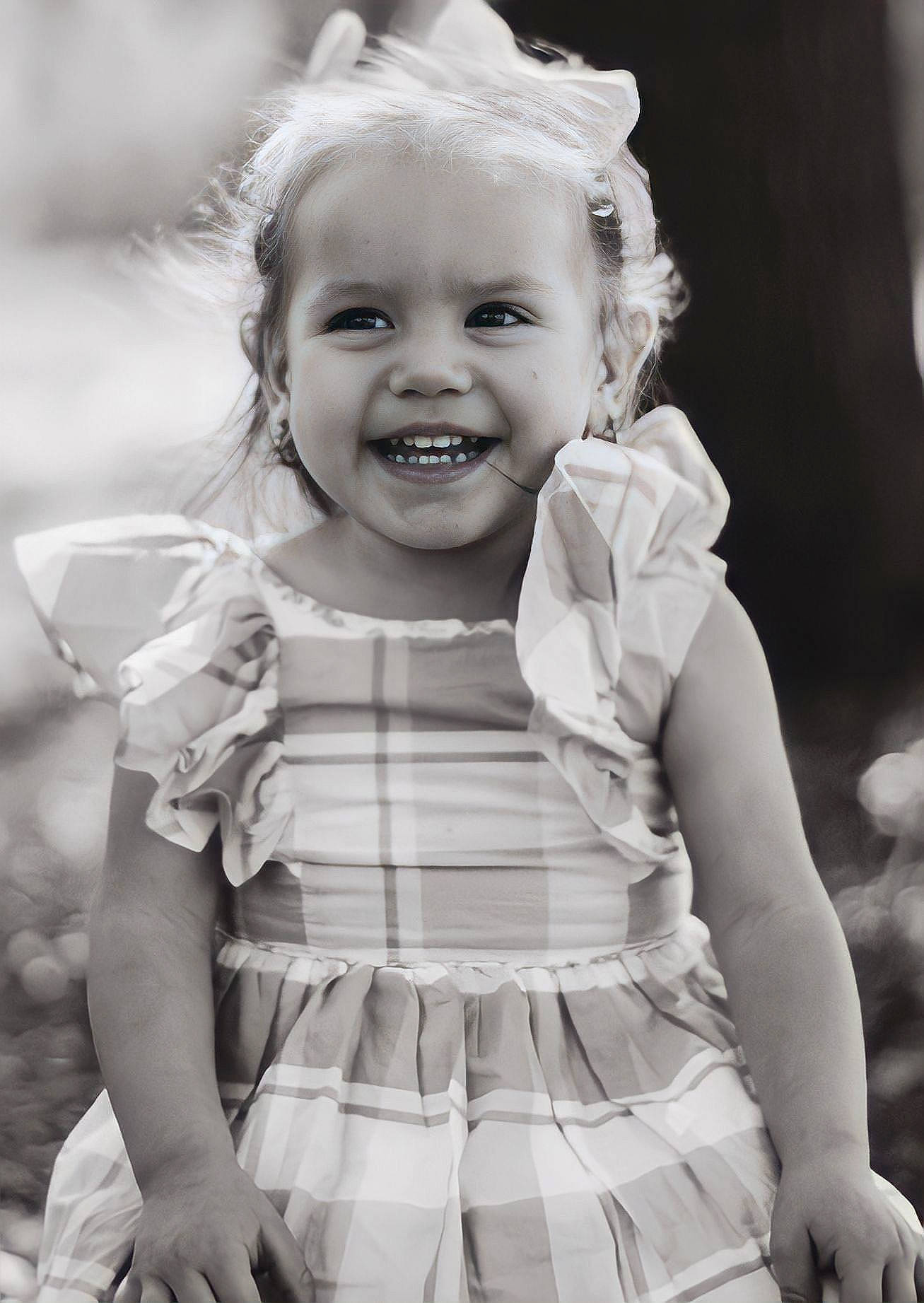 Athena is registered to the contest to win money with this photo: arm, black, black_and_white, clothing, eye, face, facial_expression, flash_photography, gesture, hair, hairstyle, happy, head, joy, organ, people_in_nature, person, photograph, skin, sleeve