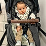 adult, baby, bed, clothing, cradle, face, female, footwear, furniture, happy, head, infantbed, person, photography, portrait, shoe, shopping, smile, stroller, woman