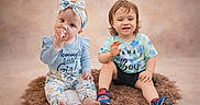 Ashlee joined the competition — help win amazing prizes! baby, bow, boy, child, clothing, cute, girl, happy, headband, indoor, pacifier, portrait, rug, shoes, siblings, sitting, smile, studio, toddler, waving