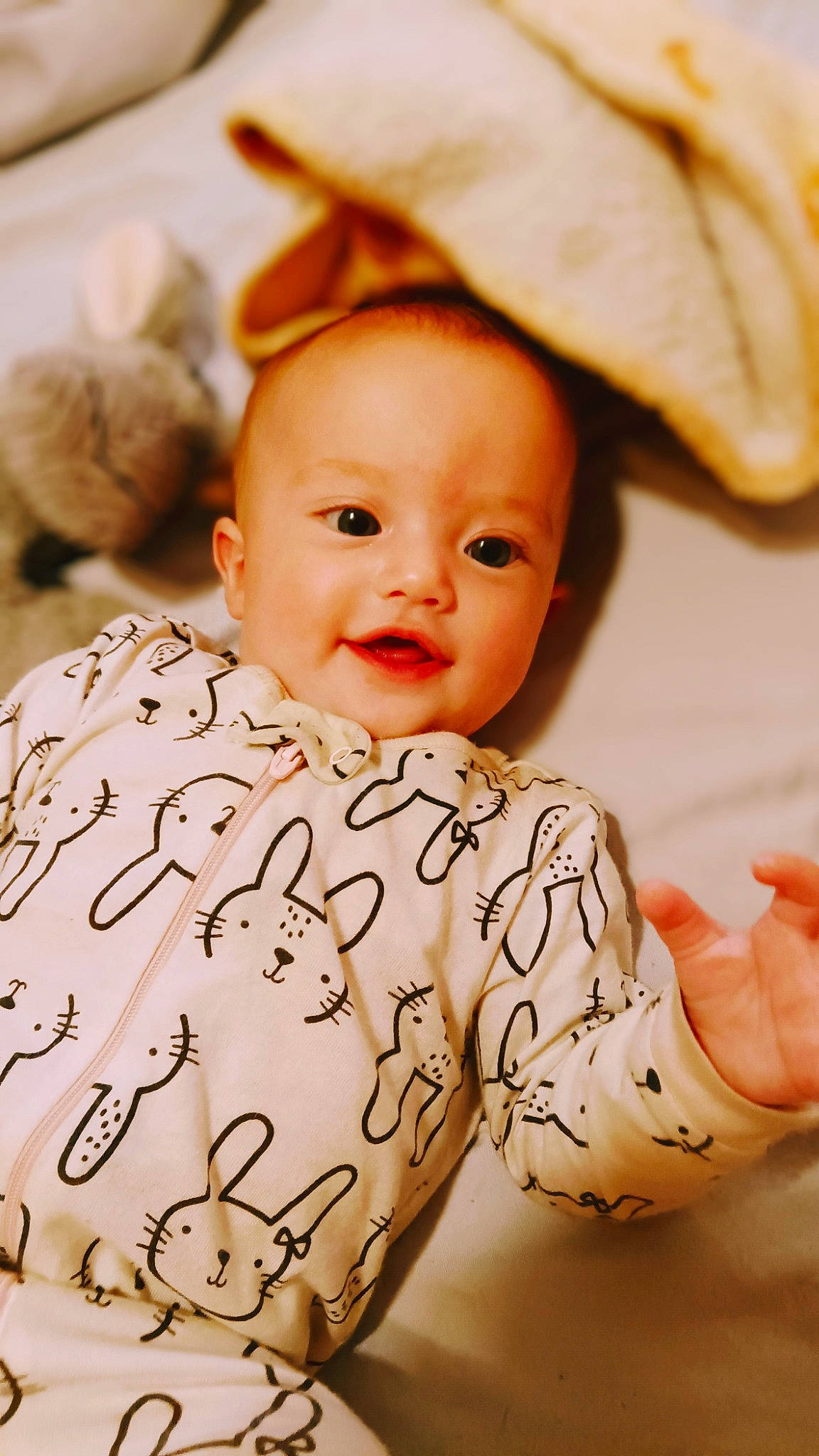 Raina is registered to the contest to win money with this photo: baby, baby_toddler_clothing, beauty, cheek, child, close_up, comfort, happy, hat, human, linens, lip, mammal, pattern, person, skin, sleeve, smile, sun_hat, textile