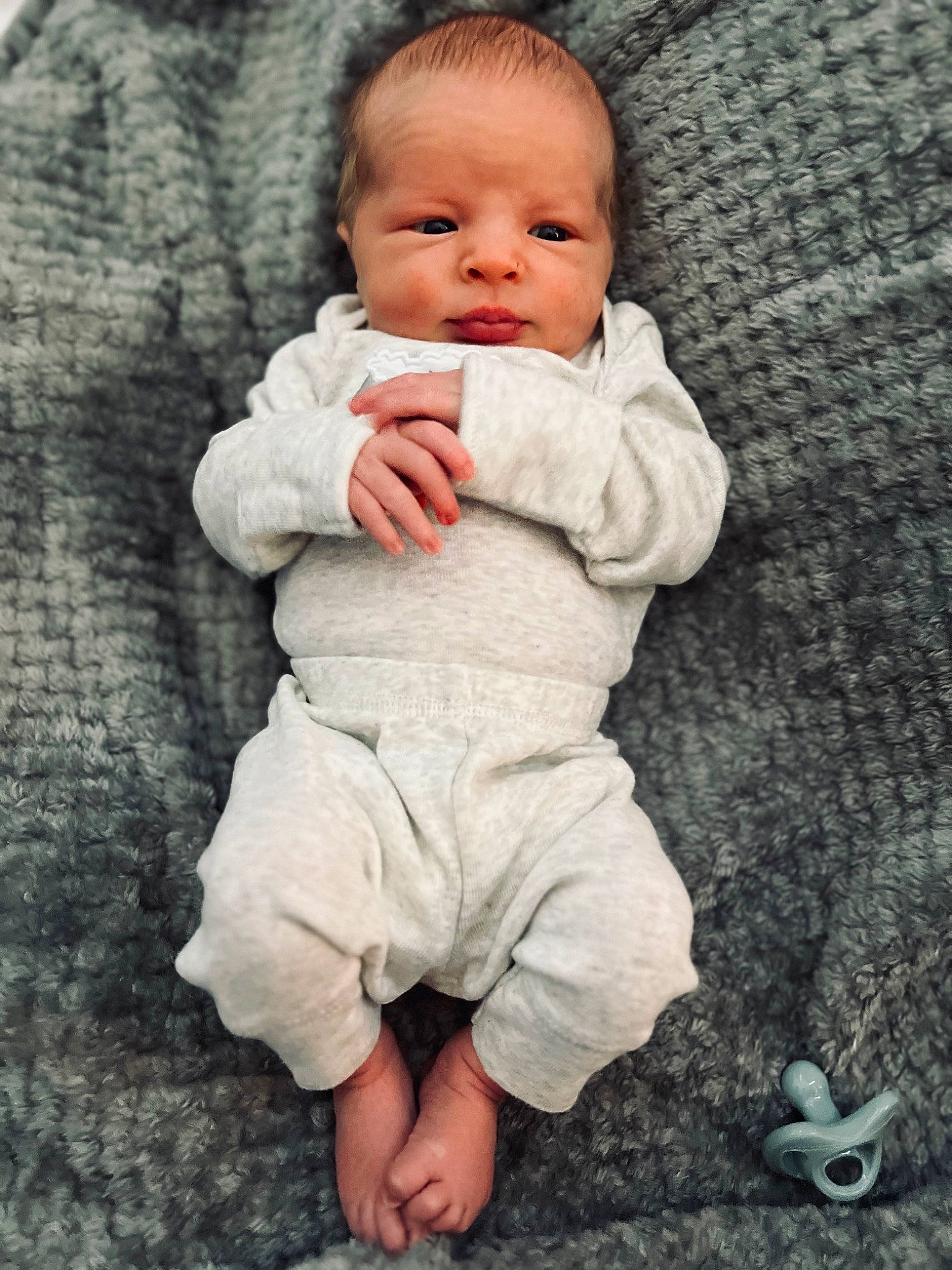 Kayce is registered to the contest to win money with this photo: art, baby, baby_toddler_clothing, cheek, chin, comfort, eye, face, finger, flooring, gesture, hand, happy, head, nose, person, skin, sleeve, textile, toddler