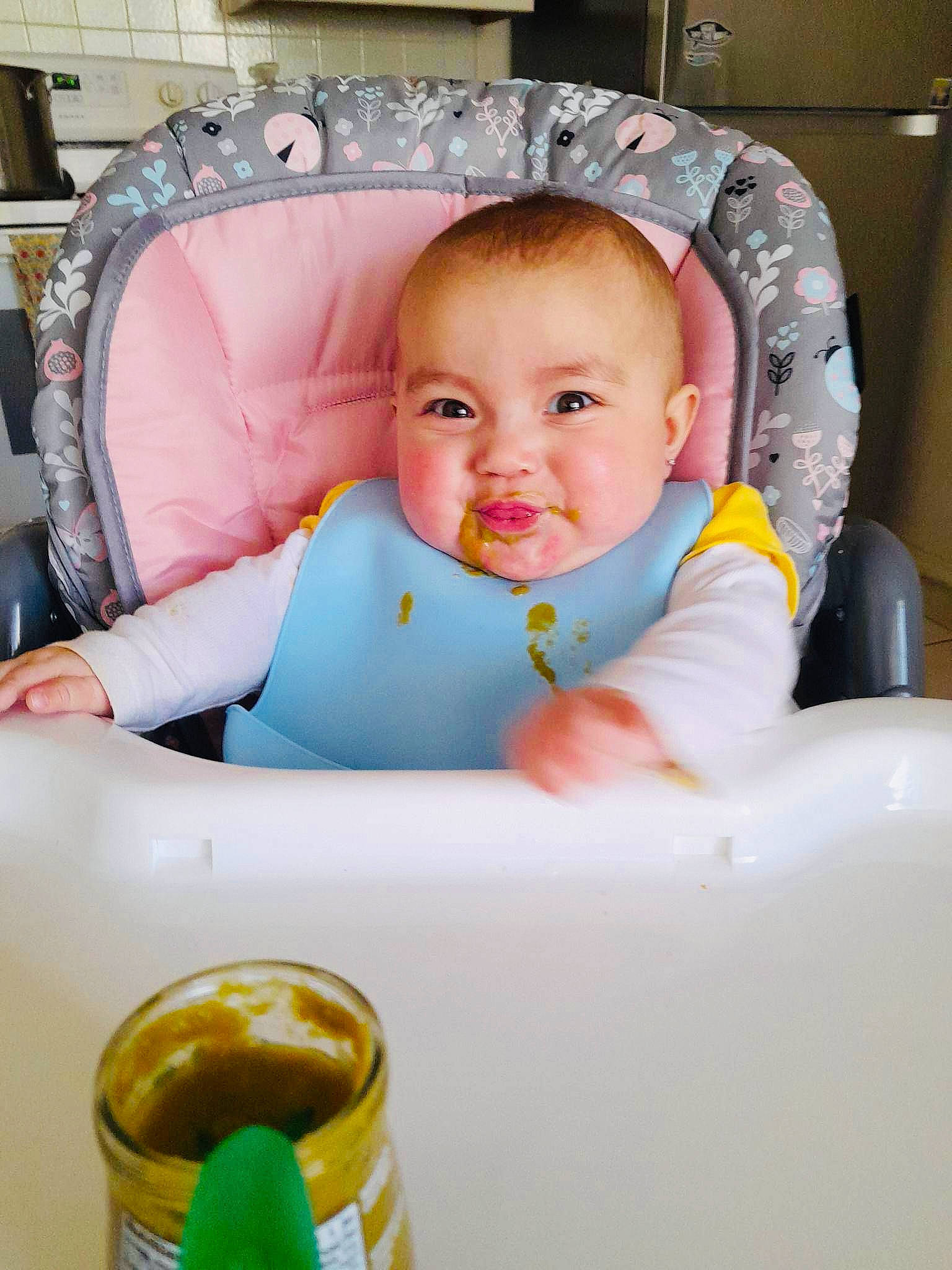 Bethany joined the competition — help win amazing prizes! baby, baby_products, baby_safety, baby_toddler_clothing, bib, chair, cheek, child, comfort, fun, happy, person, room, sitting, skin, smile, toddler