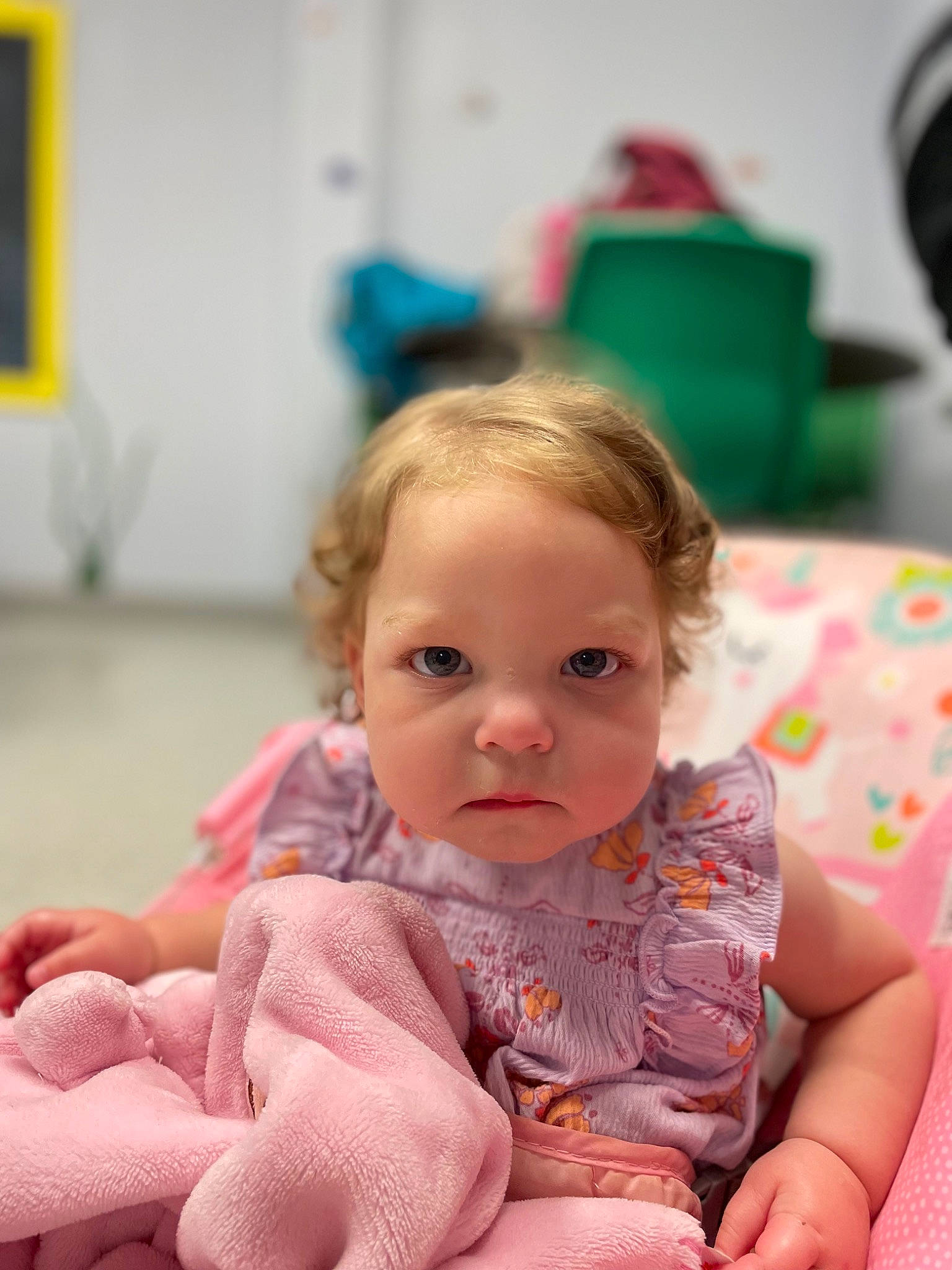 Reign is registered to the contest to win money with this photo: baby, baby_toddler_clothing, beauty, cheek, child, comfort, eye, facial_expression, finger, flooring, fun, hand, happy, person, photograph, sitting, skin, sleeve, snapshot, toddler