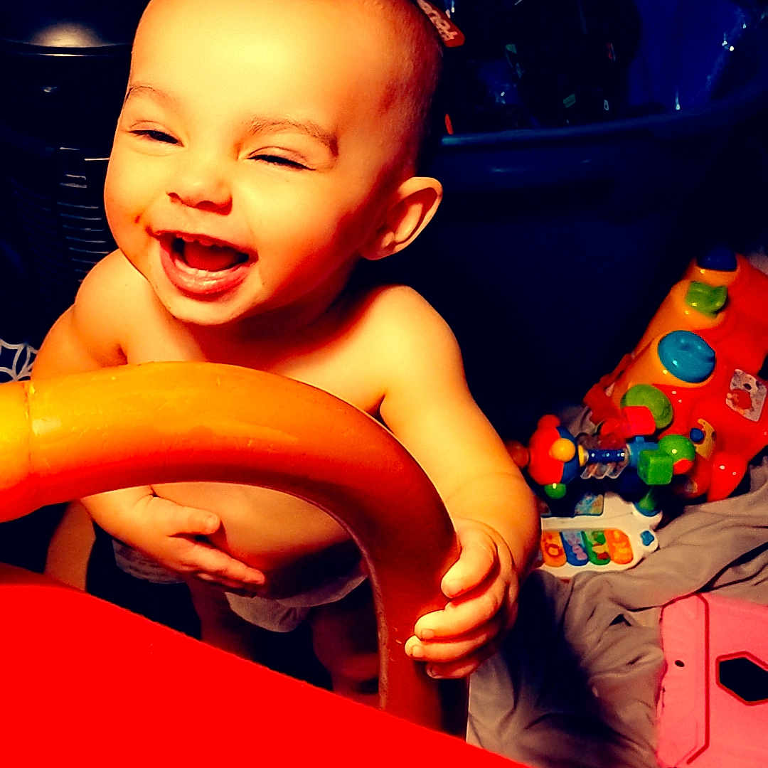 Kynzlynn joined the competition — help win amazing prizes! baby, blanket, child, colorful, cute, diaper, expression, face, furniture, happy, indoor, infant, joy, light, person, playtime, small_hand, smiling, toys, wooden_chair