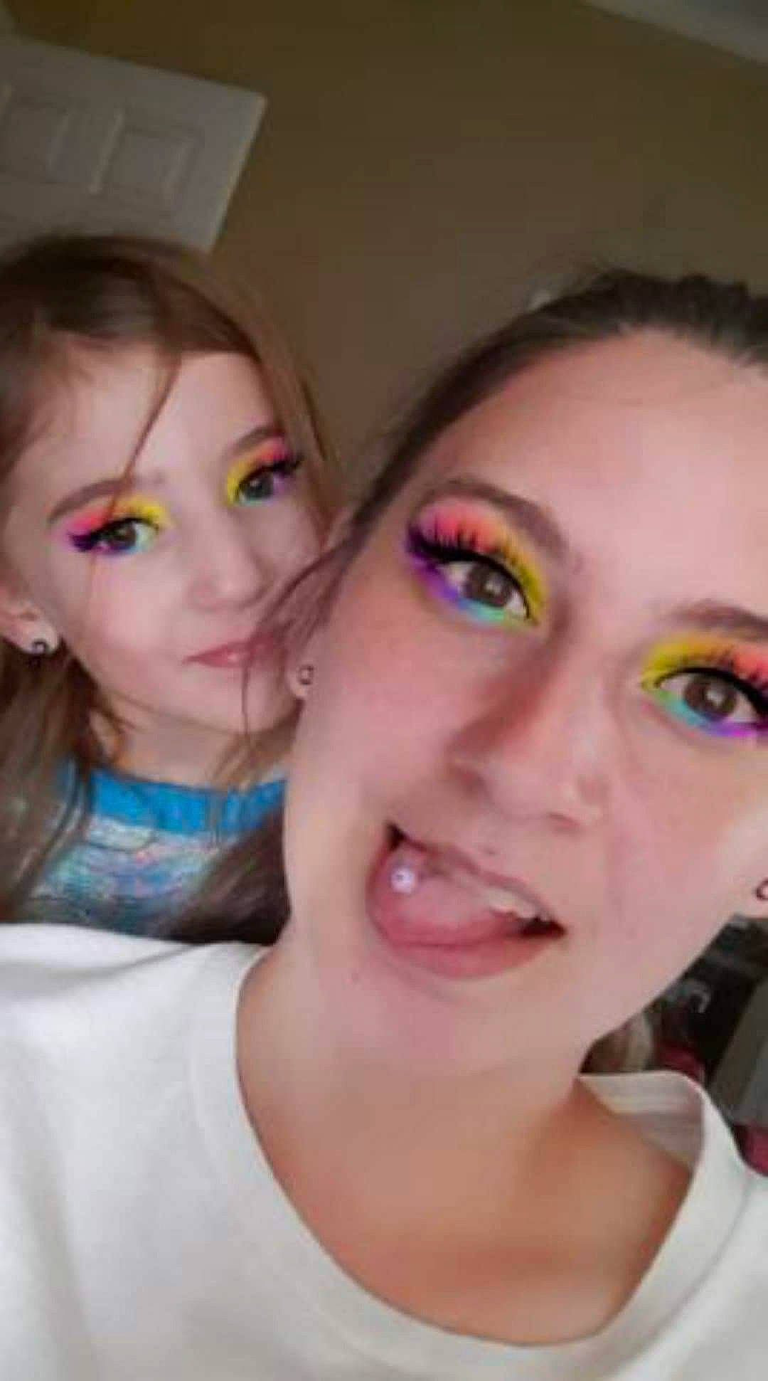 Elle is registered to the contest to win money with this photo: black_hair, cheek, chin, cool, ear, earrings, eye_liner, eyebrow, eyelash, eyewear, iris, jaw, joy, lip, makeover, mouth, nose, person, pink, purple