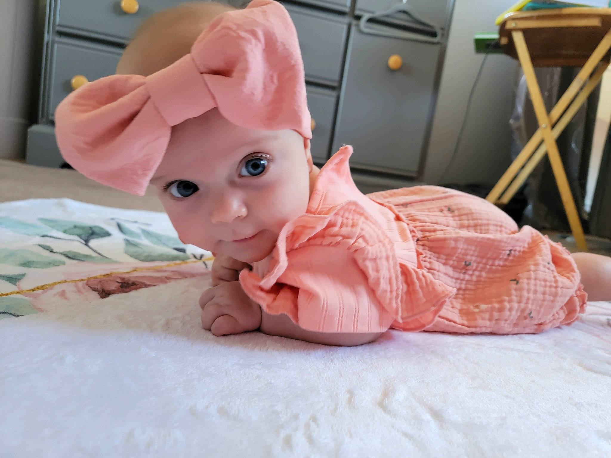 Sage joined the competition — help win amazing prizes! baby, baby_toddler_clothing, cap, carmine, chair, child, comfort, costume_hat, fashion_accessory, flesh, flooring, headwear, linens, peach, person, pink, room, sitting, skin, toddler