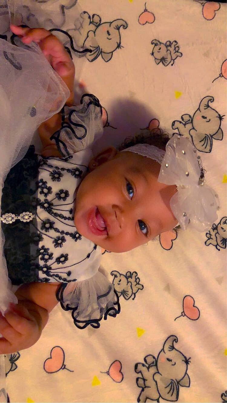 Jaliyah joined the competition — help win amazing prizes! baby, baby_products, baby_toddler_clothing, cheek, child, gesture, happy, headwear, linens, nail, nose, pattern, person, photography, pink, room, skin, sleeve, smile, textile