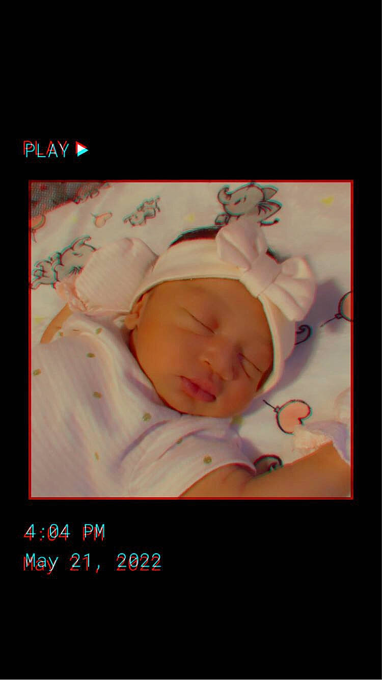 Jaliyah is registered to the contest to win money with this photo: art, baby, baby_products, baby_sleeping, baby_toddler_clothing, cheek, child, comfort, font, happy, headwear, pattern, person, photo_caption, picture_frame, portrait_photography, sleeve, toddler
