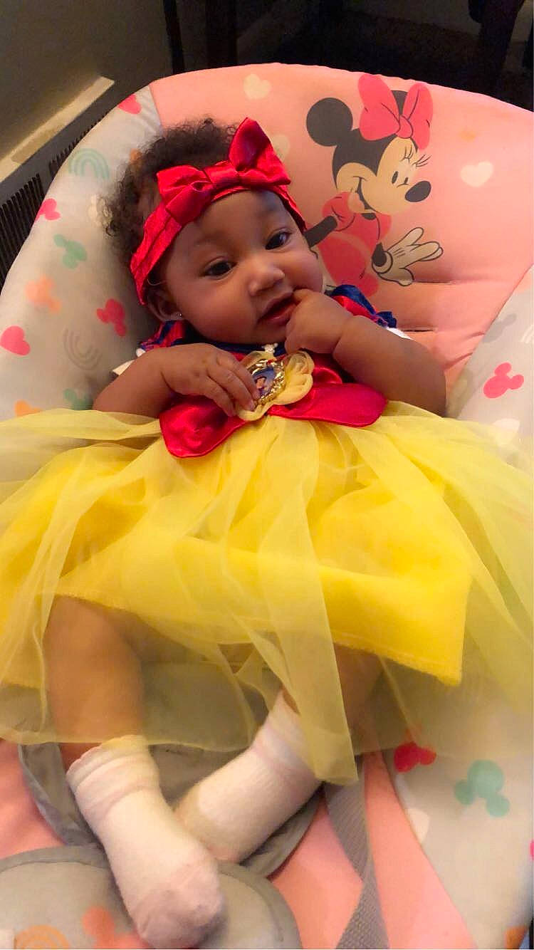 Jaliyah joined the competition — help win amazing prizes! baby, baby_products, baby_toddler_clothing, child, comfort, dress, event, eye, face, fun, happy, head, headgear, headwear, magenta, peach, person, pink, skin, smile