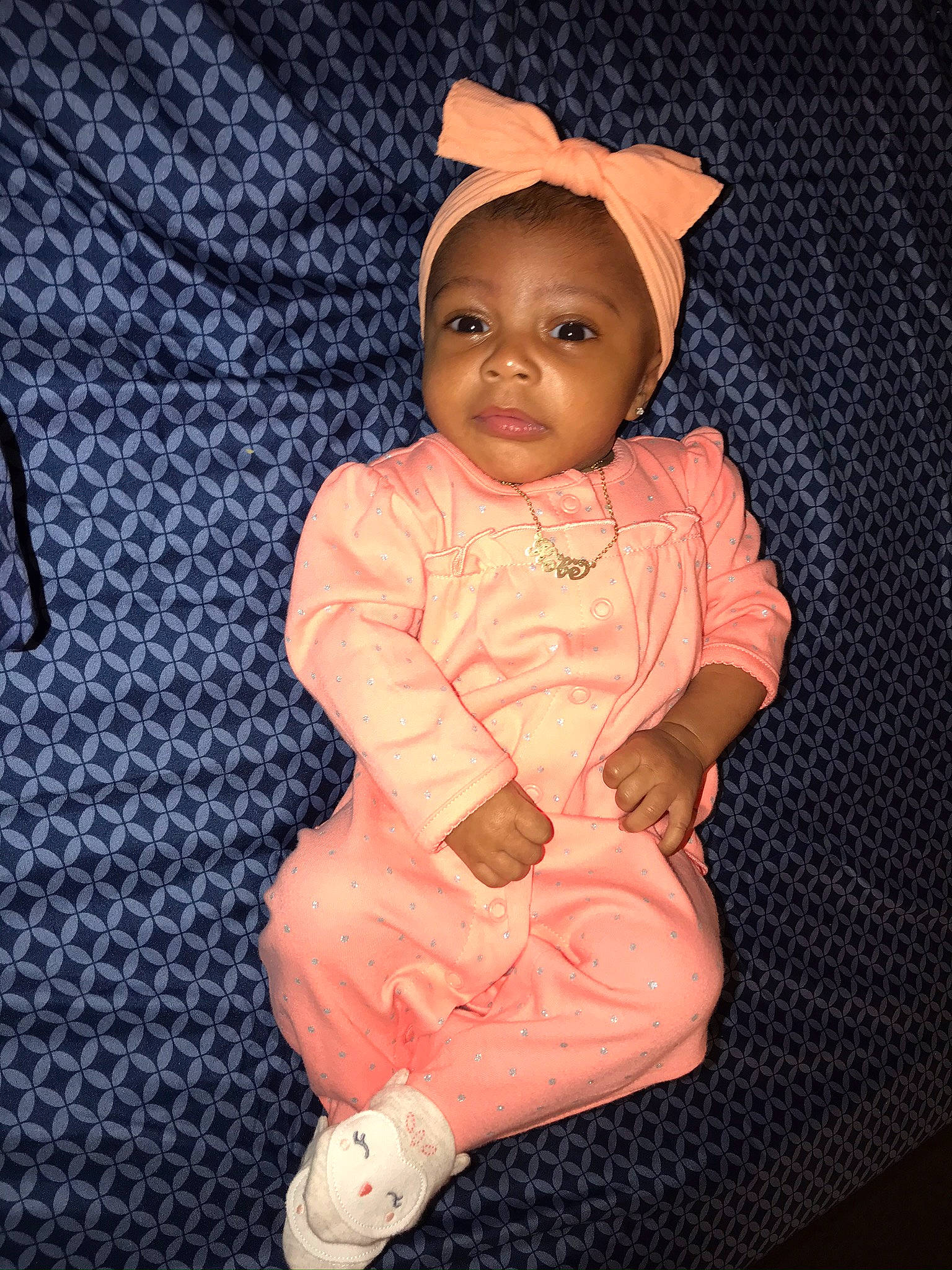Kobe is registered to the contest to win money with this photo: baby, baby_toddler_clothing, child, headgear, person, pink, smile, toddler