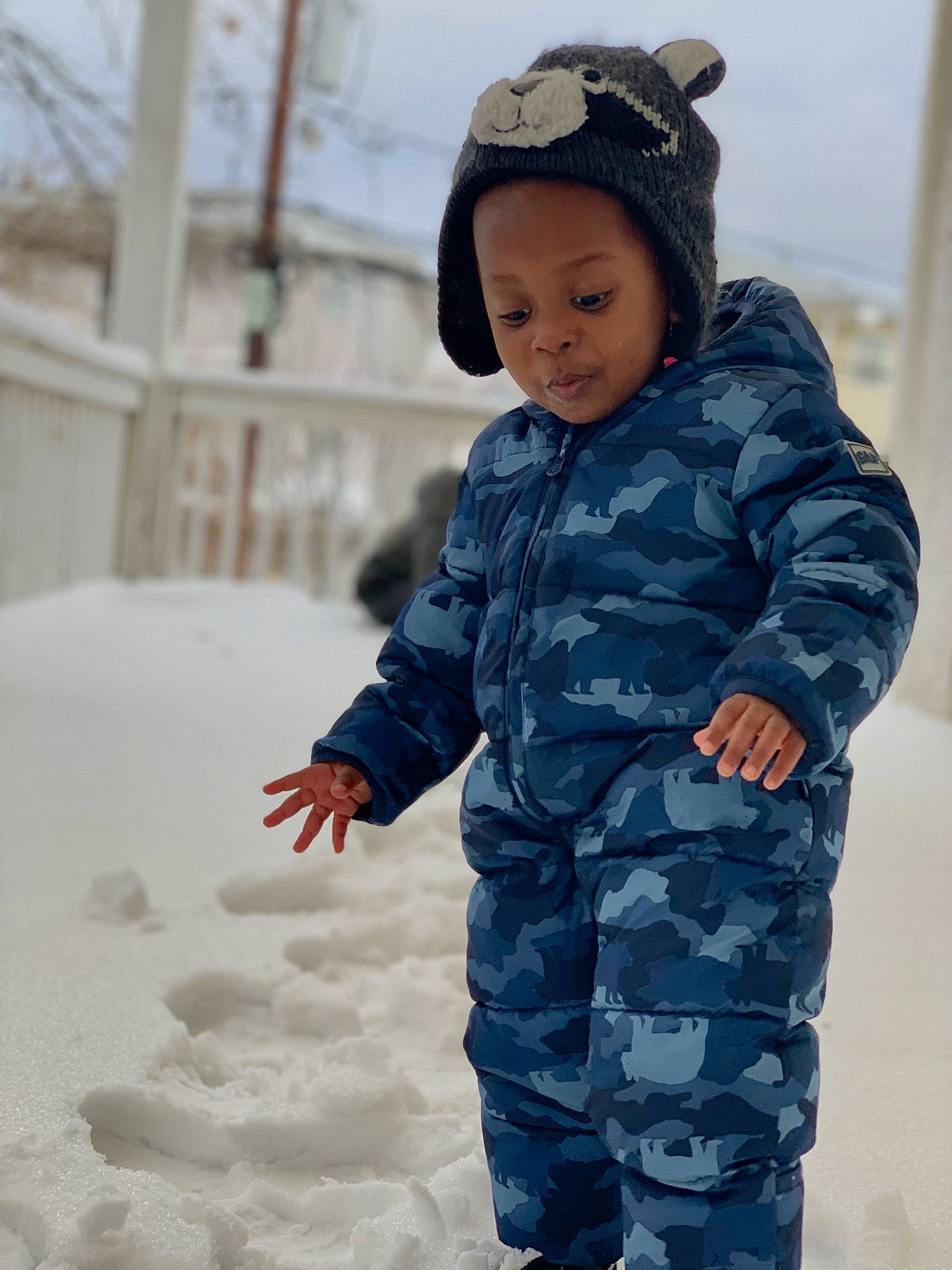 Zakai joined the competition — help win amazing prizes! baby_toddler_clothing, cap, child, electric_blue, face, freezing, fun, fur, gesture, happy, head, outerwear, pattern, person, playing_in_the_snow, sky, sleeve, snow, street_fashion, toddler