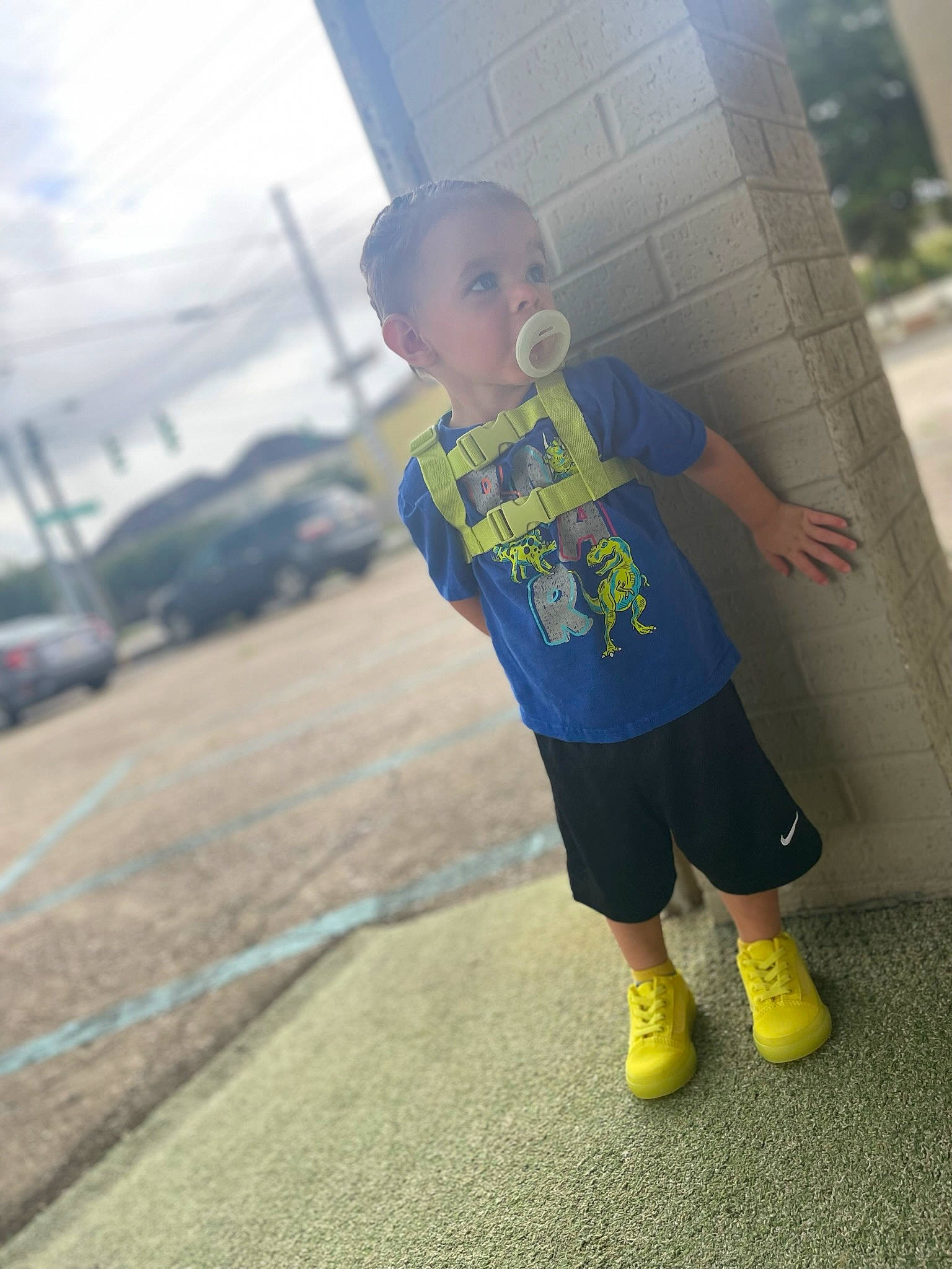 Lucas is registered to the contest to win money with this photo: asphalt, cloud, cool, electric_blue, eyewear, flooring, fun, grass, happy, human_leg, leg, leisure, metal, person, recreation, shorts, sky, sleeve, sportswear, t_shirt