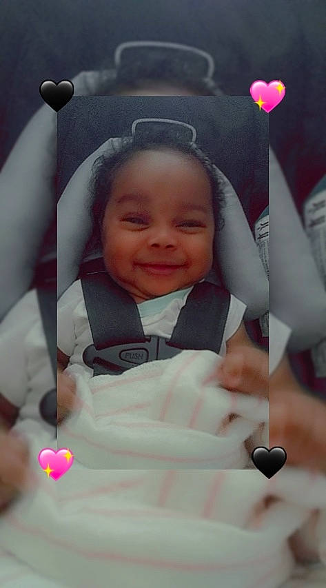 Lani is registered to the contest to win money with this photo: baby, baby_in_car_seat, baby_products, baby_toddler_clothing, child, comfort, facial_expression, finger, flash_photography, fun, gesture, happy, human, joy, people, person, product, skin, smile, thumb