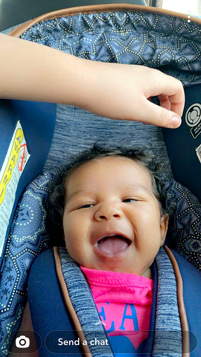 Cambree is registered to the contest to win money with this photo: baby, blue, cheek, chin, eye, eyebrow, face, facial_expression, happy, head, human, lip, mouth, nose, organ, person, photograph, skin, smile, textile