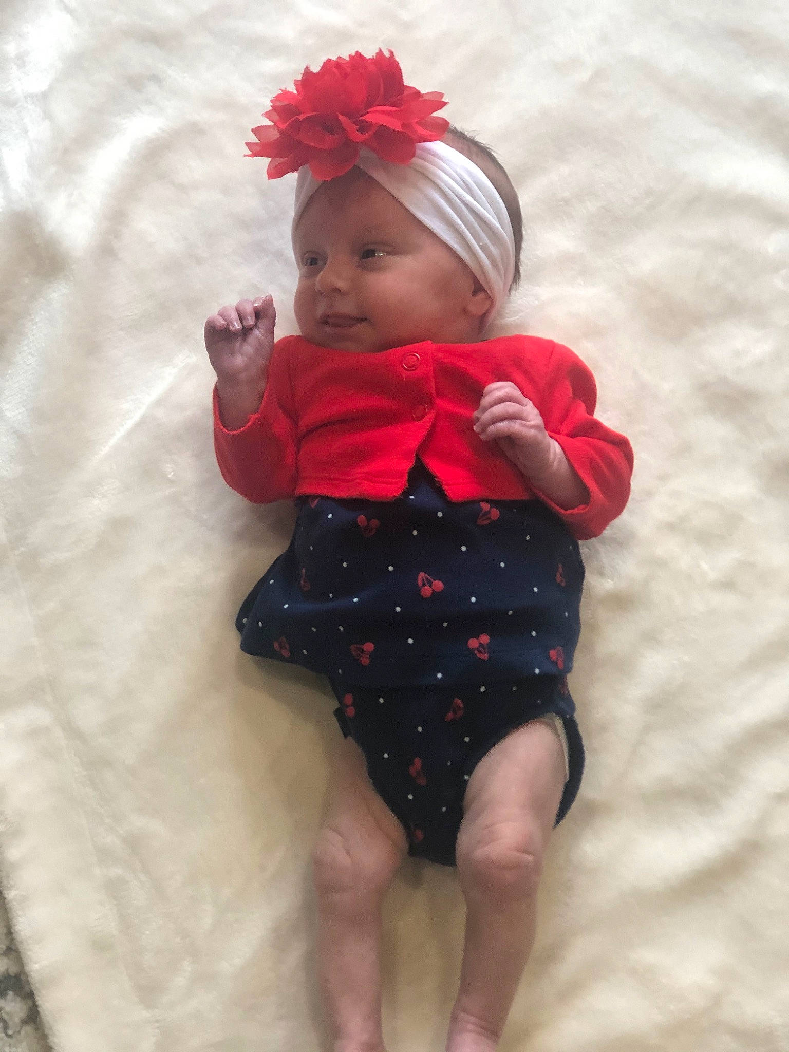 Kensley is registered to the contest to win money with this photo: baby, baby_products, baby_toddler_clothing, cheek, child, design, face, fun, hair_accessory, head, headgear, headwear, pattern, person, photography, pink, polka_dot, product, red, skin