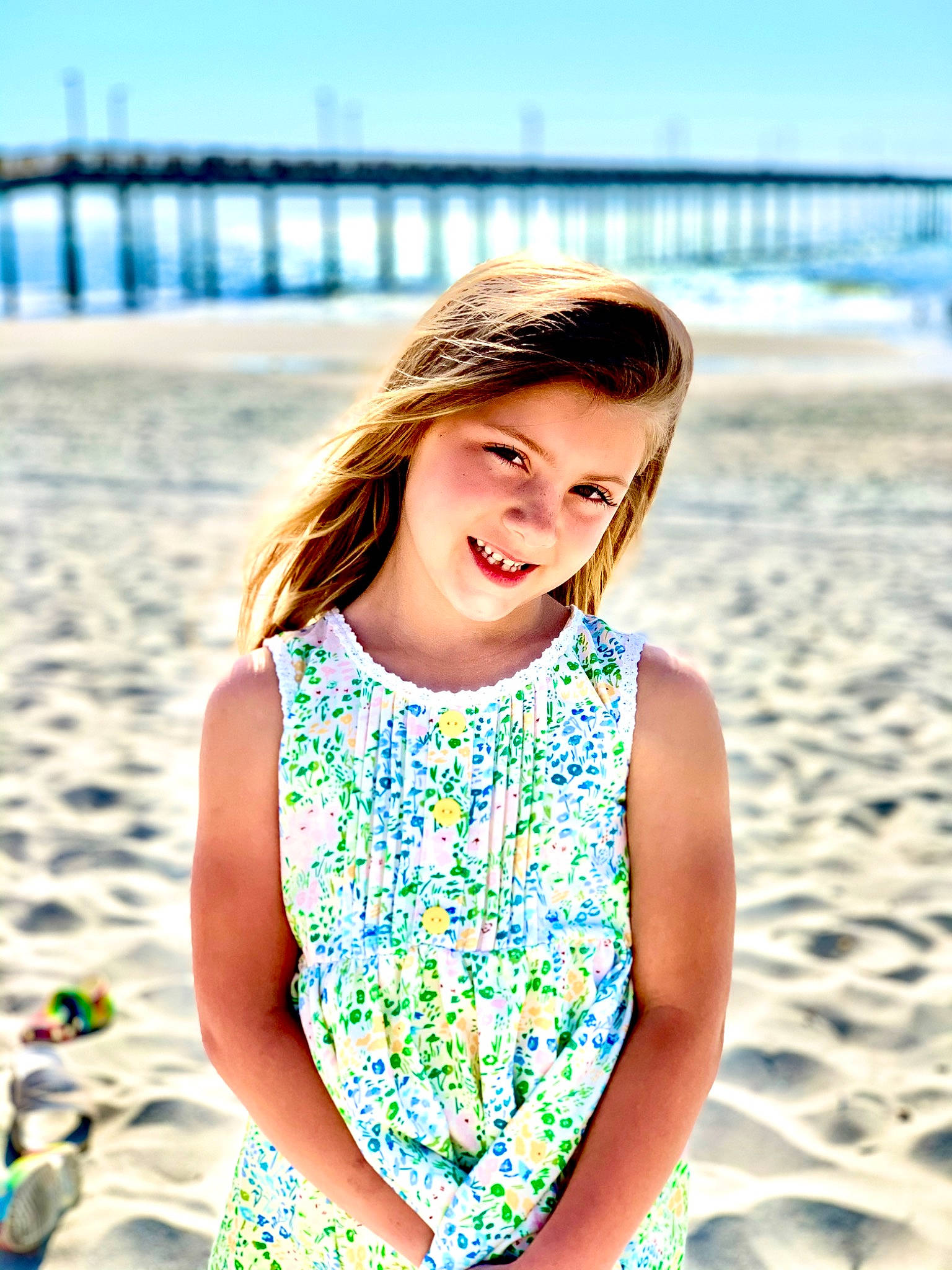Hallie Claire is registered to the contest to win money with this photo: azure, beach, blue, body_of_water, dress, flash_photography, fun, hairstyle, happy, joy, leisure, morning, people, people_in_nature, people_on_beach, person, sky, smile, summer, sunlight