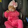 automobile, baby, baby_fashion, car_seat, child, closed_eyes, cozy, flower_bow, headband, indoors, infant, nap, pacifier, photography, pink_clothing, portrait, safety_harness, seated, sleeping, vehicle