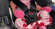 Ashly is registered to the contest to win money with this photo: baby, car_seat, child, closed_eyes, harness, indoors, infant, mittens, newborn, pacifier, peaceful, pink_outfit, portrait, safety_seat, seatbelt, sleeping, sock, strawberry_pattern, travel, vehicle
